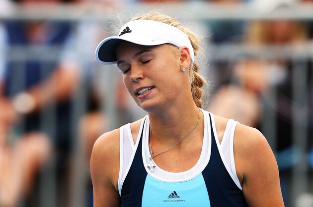 SYDNEY, AUSTRALIA - JANUARY 07:  Caroline Wozniacki of Denmark looks dejected after losing a point in her match against Lucie Safarova of the Czech Republic during day three of the 2014 Sydney International at Sydney Olympic Park Tennis Centre on January 7, 2014 in Sydney, Australia.  (Photo by Mark Nolan/Getty Images)