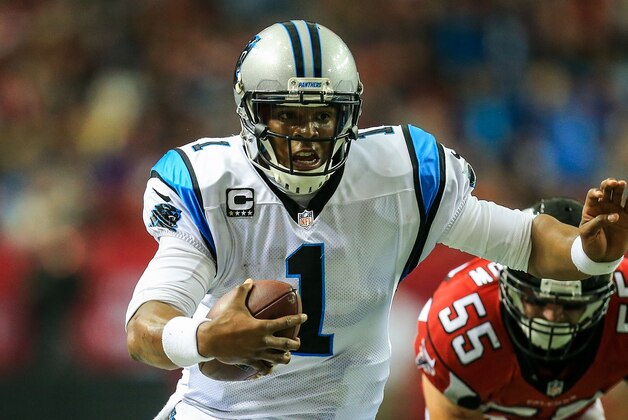 Dec 29, 2013; Atlanta, GA, USA; Carolina Panthers quarterback Cam Newton (1) runs the ball in the first half against the Carolina Panthers at the Georgia Dome. Mandatory Credit: Daniel Shirey-USA TODAY Sports