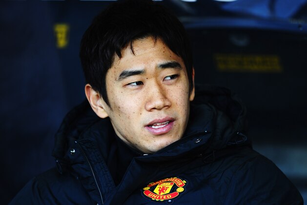 HULL, ENGLAND - DECEMBER 26:  Shinji Kagawa of Manchester United is seen on the bench during the Barclays Premier League match between Hull City and Manchester United at KC Stadium on December 26, 2013 in Hull, England.  (Photo by Laurence Griffiths/Getty Images)