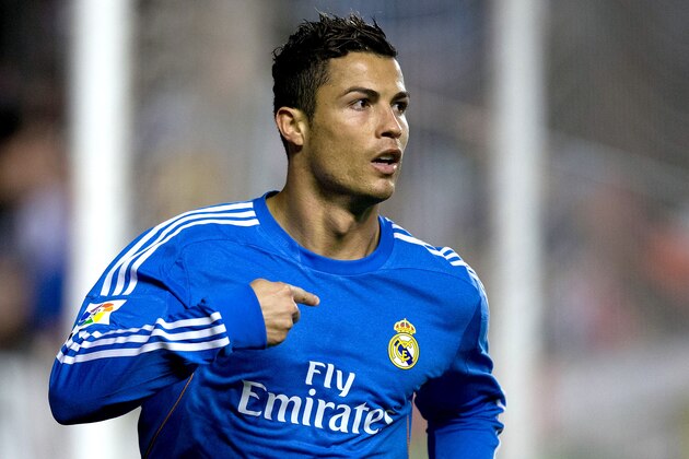 MADRID, SPAIN - NOVEMBER 02:  Cristiano Ronaldo of Real Madrid CF celebrates scoring their opening goal during the La Liga match between Rayo Vallecano de Madrid and Real Madrid CF  at Estadio de Vallecas on November 2, 2013 in Madrid, Spain.  (Photo by Gonzalo Arroyo Moreno/Getty Images)