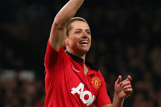 MANCHESTER, ENGLAND - JANUARY 05:  Javier Hernandez of Manchester United celebrates scoring his team's first goal during the FA Cup with Budweiser Third round match between Manchester United and Swansea City at Old Trafford on January 5, 2014 in Manchester, England.  (Photo by Alex Livesey/Getty Images)