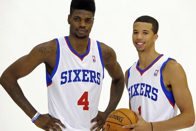 Sep 27, 2013; Philadelphia, PA, USA;  Philadelphia 76ers center Nerlens Noel (4) and point guard Michael Carter-Williams (1) during a media day photo shoot at Philadelphia College of Osteopathic Medicine. Mandatory Credit: Eric Hartline-USA TODAY Sports