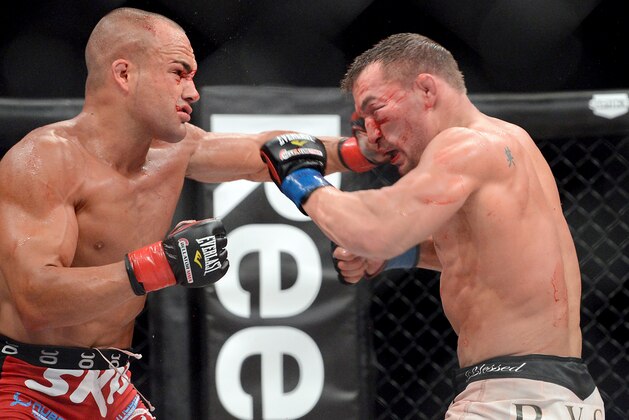 Nov 2, 2013; Long Beach, CA, USA;   Eddie Alvarez (red gloves ) and Michael Chandler (blue gloves) during their Bellator Lightweight World Championship fight at the Long Beach Arena. Alvarez won the fight. Mandatory Credit: Jayne Kamin-Oncea-USA TODAY Sports