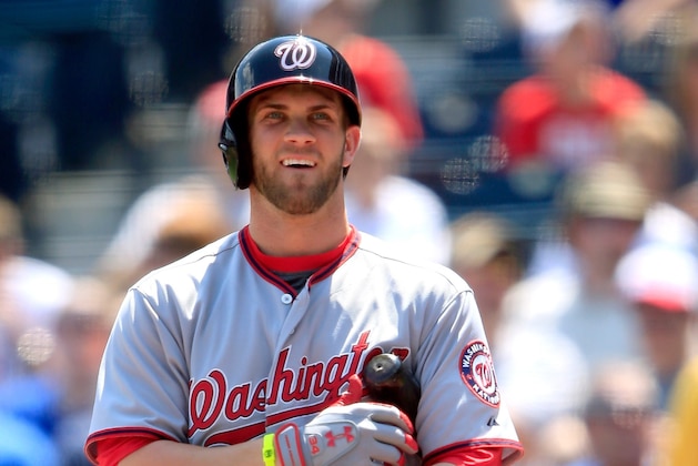 KANSAS CITY, MO - AUGUST 25:  Bryce Harper #34 of the Washington Nationals bats during the game against the Kansas City Royals at Kauffman Stadium on August 25, 2013 in Kansas City, Missouri.  (Photo by Jamie Squire/Getty Images)