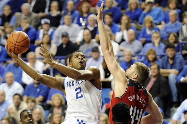 Dec 28, 2013; Lexington, KY, USA; Kentucky Wildcats guard Aaron Harrison (2) shoots against Louisville Cardinals forward Stephan Van Treese (44) during the second half at Rupp Arena. Kentucky defeated Louisville 73-66. Mandatory Credit: Jamie Rhodes-USA TODAY Sports Dec 28, 2013; Lexington, KY, USA; Kentucky Wildcats guard Aaron Harrison (2) shoots against Louisville Cardinals forward Stephan Van Treese (44) during the second half at Rupp Arena. Kentucky defeated Louisville 73-66. Mandatory Credit: Jamie Rhodes-USA TODAY Sports