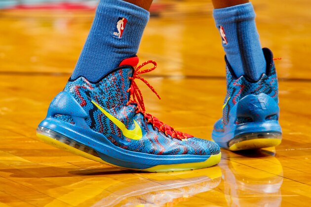 MIAMI, FL - DECEMBER 25: A close-up of the seasonal Nike sneakers of Kevin Durant #35 of the Oklahoma City Thunder as he plays against the Miami Heat during a Christmas Day game on December 25, 2012 at American Airlines Arena in Miami, Florida. NOTE TO USER: User expressly acknowledges and agrees that, by downloading and/or using this photograph, user is consenting to the terms and conditions of the Getty Images License Agreement. Mandatory copyright notice: Copyright NBAE 2012 (Photo by Issac Baldizon/NBAE via Getty Images)