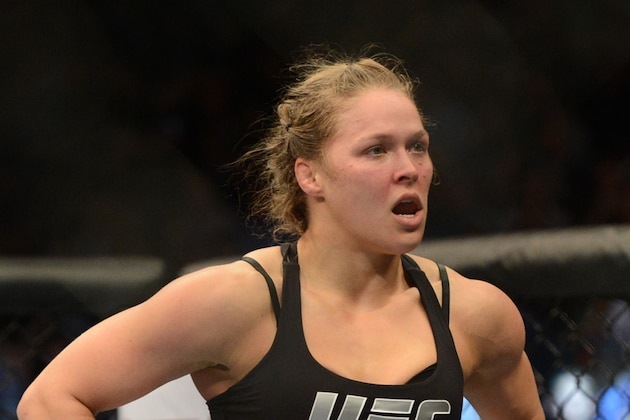 Dec 28, 2013; Las Vegas, NV, USA;    Ronda Rousey in the cage after defeating Miesha Tate (not pictured) in their UFC Women's Bantamweight Championship Bout at the MGM Grand Garden Arena. Rousey won with an arm bar in the third round. Mandatory Credit: Jayne Kamin-Oncea-USA TODAY Sports