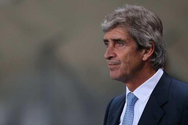 MANCHESTER, ENGLAND - DECEMBER 26:  Manuel Pellegrini the manager of Manchester City looks on during the Barclays Premier League match between Manchester City and Liverpool at Etihad Stadium on December 26, 2013 in Manchester, England.  (Photo by Alex Livesey/Getty Images)