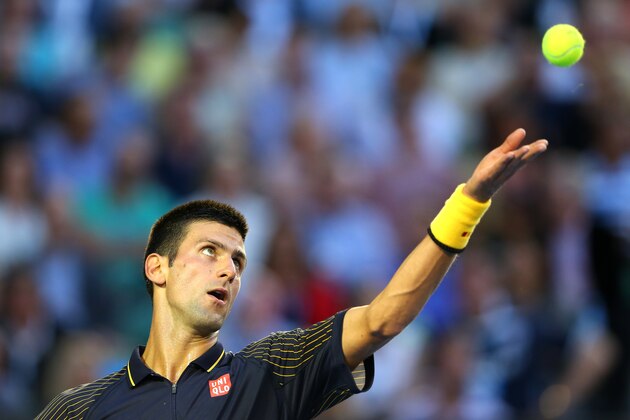 MELBOURNE, AUSTRALIA - JANUARY 27:  Novak Djokovic of Serbia serves in his men's final match against Andy Murray of Great Britain during day fourteen of the 2013 Australian Open at Melbourne Park on January 27, 2013 in Melbourne, Australia.  (Photo by Julian Finney/Getty Images)