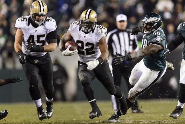Jan 4, 2014; Philadelphia, PA, USA; New Orleans Saints running back Mark Ingram (22) carries the ball during the third quarter against the Philadelphia Eagles during the 2013 NFC wild card playoff football game at Lincoln Financial Field. Mandatory Credit: Howard Smith-USA TODAY Sports