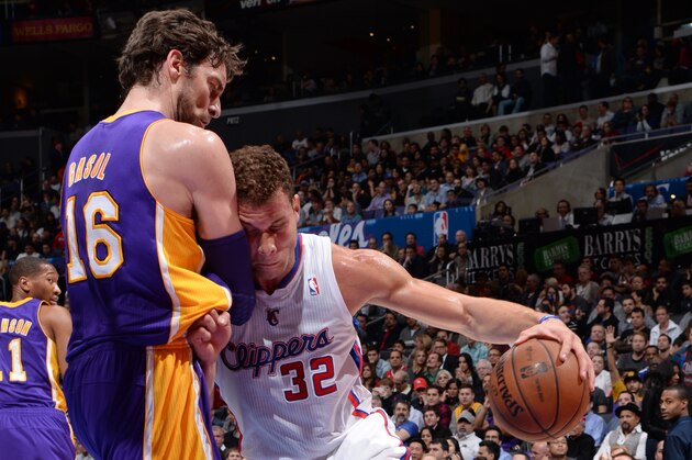 LOS ANGELES, CA - JANUARY 10: Blake Griffin #32 of the Los Angeles Clippers drives to the basket against Pau Gasol #16 of the Los Angeles Lakers at STAPLES Center on January 10, 2014 in Los Angeles, California. NOTE TO USER: User expressly acknowledges and agrees that, by downloading and/or using this Photograph, user is consenting to the terms and conditions of the Getty Images License Agreement. Mandatory Copyright Notice: Copyright 2014 NBAE (Photo by Andrew D. Bernstein/NBAE via Getty Images)