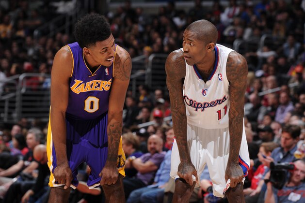 LOS ANGELES, CA - JANUARY 10: Nick Young #0 of the Los Angeles Lakers and Jamal Crawford #11 of the Los Angeles Clippers during a game at STAPLES Center on January 10, 2014 in Los Angeles, California. NOTE TO USER: User expressly acknowledges and agrees that, by downloading and/or using this Photograph, user is consenting to the terms and conditions of the Getty Images License Agreement. Mandatory Copyright Notice: Copyright 2014 NBAE (Photo by Andrew D. Bernstein/NBAE via Getty Images)