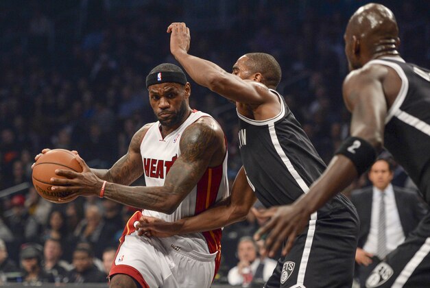 Jan 10, 2014; Brooklyn, NY, USA; Miami Heat small forward LeBron James (6) drives to the basket against the Brooklyn Nets during the first half at Barclays Center. Mandatory Credit: Joe Camporeale-USA TODAY Sports