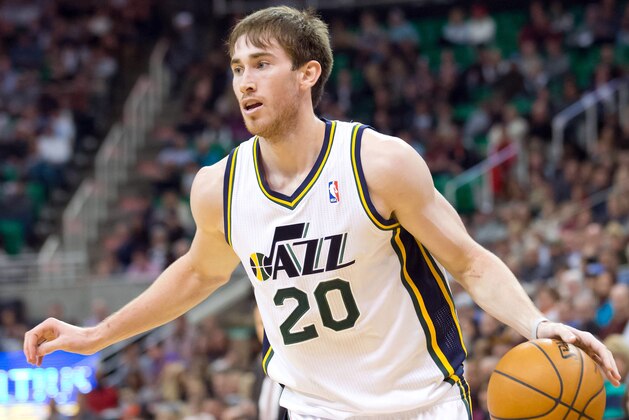 Jan 7, 2014; Salt Lake City, UT, USA; Utah Jazz shooting guard Gordon Hayward (20) dribbles during the second half against the Oklahoma City Thunder at EnergySolutions Arena. The Jazz won 112-101. Mandatory Credit: Russ Isabella-USA TODAY Sports