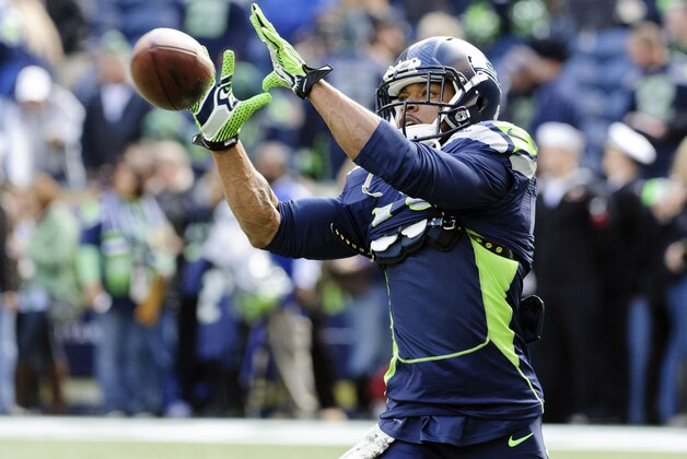Nov 17, 2013; Seattle, WA, USA; Seattle Seahawks wide receiver Percy Harvin (11) catches a pass during pre game warm ups prior to the game against the Minnesota Vikings at CenturyLink Field. Mandatory Credit: Steven Bisig-USA TODAY Sports