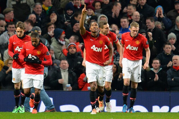 MANCHESTER, ENGLAND - JANUARY 11:  Luis Antonio Valencia of Manchester United celebrates scoring the opening goal during the Barclays Premier League match between Manchester United and Swansea City at Old Trafford on January 11, 2014 in Manchester, England.  (Photo by Shaun Botterill/Getty Images)
