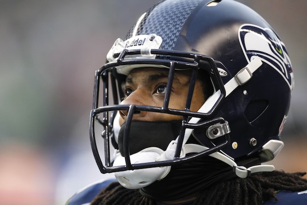 Dec 29, 2013; Seattle, WA, USA; Seattle Seahawks cornerback Richard Sherman (25) looks at the scoreboard during a fourth quarter against the St. Louis Rams at CenturyLink Field. Mandatory Credit: Joe Nicholson-USA TODAY Sports