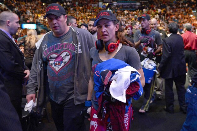Dec 28, 2013; Las Vegas, NV, USA;   Miesha Tate leaves the arena after her UFC Women's Bantamweight Championship Bout against Ronda Rousey (not pictured) at the MGM Grand Garden Arena. Rousey won. Mandatory Credit: Jayne Kamin-Oncea-USA TODAY Sports