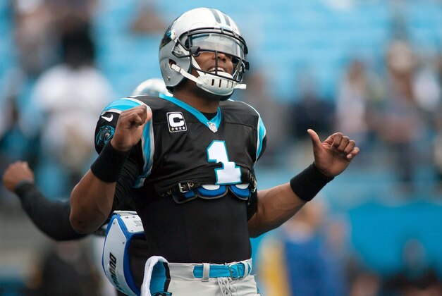 Dec 22, 2013; Charlotte, NC, USA; Carolina Panthers quarterback Cam Newton (1) stands on the field prior to the start of the game against the New Orleans Saints at Bank of America Stadium. Mandatory Credit: Jeremy Brevard-USA TODAY Sports