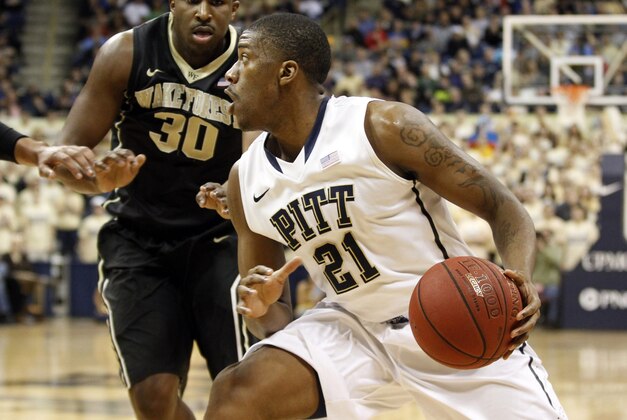 Jan 11, 2014; Pittsburgh, PA, USA; Pittsburgh Panthers forward Lamar Patterson (21) drives to the basket as Wake Forest Demon Deacons forward Travis McKie (30) defends during the first half at the Petersen Events Center. Mandatory Credit: Charles LeClaire-USA TODAY Sports Jan 11, 2014; Pittsburgh, PA, USA; Pittsburgh Panthers forward Lamar Patterson (21) drives to the basket as Wake Forest Demon Deacons forward Travis McKie (30) defends during the first half at the Petersen Events Center. Mandatory Credit: Charles LeClaire-USA TODAY Sports