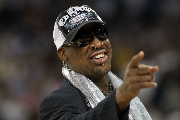 HOUSTON, TX - APRIL 04:  Naismith Memorial Basketball Hall of Fame 2011 inductee Dennis Rodman looks on during halftime of the National Championship Game of the 2011 NCAA Division I Men's Basketball Tournament at Reliant Stadium on April 4, 2011 in Houston, Texas.  (Photo by Ronald Martinez/Getty Images)
