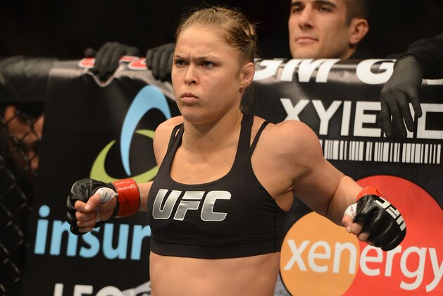 Dec 28, 2013; Las Vegas, NV, USA;   Ronda Rousey in the cage for her UFC Women's Bantamweight Championship Bout against Miesha Tate (not pictured) at the MGM Grand Garden Arena. Rousey won. Mandatory Credit: Jayne Kamin-Oncea-USA TODAY Sports