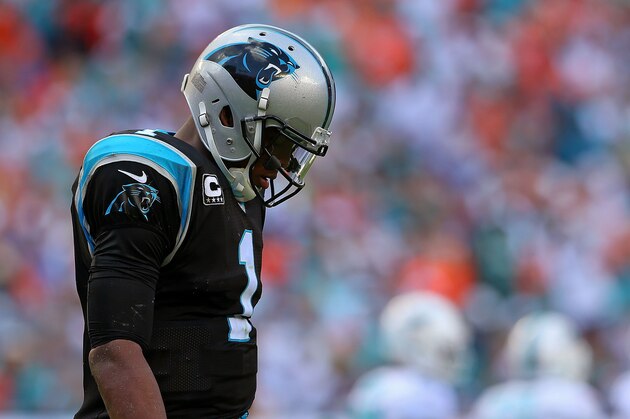 MIAMI GARDENS, FL - NOVEMBER 24:  Cam Newton #1 of the Carolina Panthers looks on during a game against the Miami Dolphins at Sun Life Stadium on November 24, 2013 in Miami Gardens, Florida.  (Photo by Mike Ehrmann/Getty Images)
