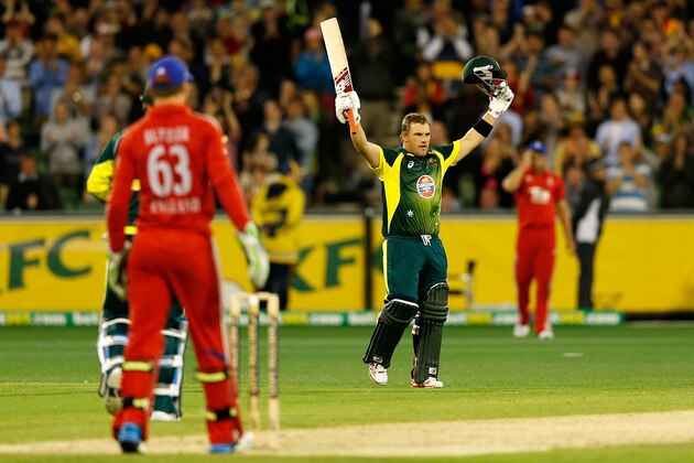 MELBOURNE, AUSTRALIA - JANUARY 12:  Aaron Finch of Australia celebrates making 100 runs during game one of the one day international series between Australia and England at Melbourne Cricket Ground on January 12, 2014 in Melbourne, Australia.  (Photo by Darrian Traynor/Getty Images)