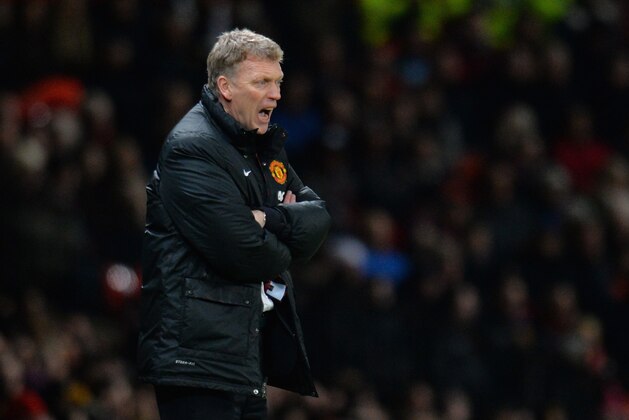 MANCHESTER, ENGLAND - JANUARY 11:  Manchester United Manager David Moyes shouts instructions during the Barclays Premier League match between Manchester United and Swansea City at Old Trafford on January 11, 2014 in Manchester, England.  (Photo by Shaun Botterill/Getty Images)