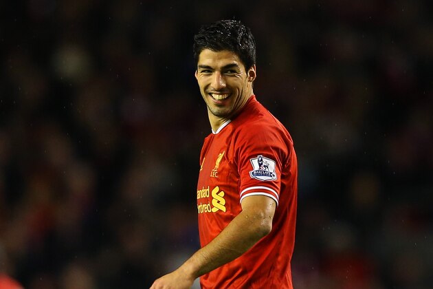 LIVERPOOL, ENGLAND - JANUARY 01: Luis Suarez of Liverpool smiles during the Barclays Premier League match between Liverpool and Hull City at Anfield on January 1, 2014 in Liverpool, England.  (Photo by Clive Brunskill/Getty Images)