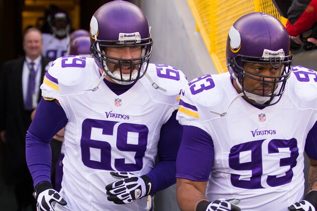 Nov 24, 2013; Green Bay, WI, USA; Minnesota Vikings defensive end Jared Allen (69) runs onto the field prior to the game against the Green Bay Packers at Lambeau Field.  The Vikings and Packers tied 26-26.  Mandatory Credit: Jeff Hanisch-USA TODAY Sports