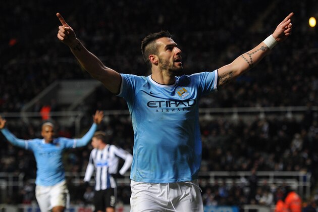 NEWCASTLE UPON TYNE, ENGLAND - JANUARY 12:  Manchester City striker Alvaro Negredo celebrates after scoring the second goal during the Barclays Premier League match between Newcastle United and Manchestre City at St James' Park on January 12, 2014 in Newcastle upon Tyne, England.  (Photo by Stu Forster/Getty Images)