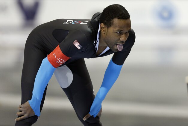 Dec 31, 2013; Kearns, UT, USA; First place finisher Shani Davis competes in the men's 1500m during the U.S. Olympic speedskating trials at Utah Olympic Oval. Mandatory Credit: Jim Urquhart-USA TODAY Sports