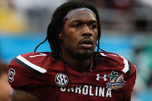 ORLANDO, FL - JANUARY 01:  Jadeveon Clowney #7 of the South Carolina Gamecocks walks off the field at the end of the first half of their game against the Wisconsin Badgers at the Capital One Bowl on January 1, 2014 in Orlando, Florida.  (Photo by Scott Halleran/Getty Images)
