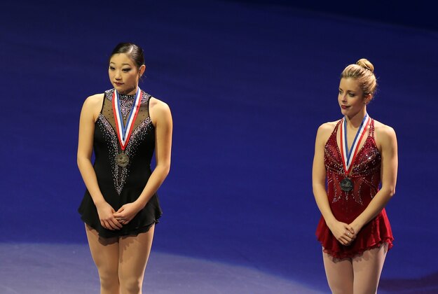 Jan 11, 2014; Boston, MA, USA;  (From left to right) Silver medalist- Polina Edmunds, gold medalist- Gracie Gold, bronze medalist- Mirai Nagasu, pewter medalist Ashley Wagner stand on the podium after the Ladies Free Skate at the TD Garden. Mandatory Credit: Winslow Townson-USA TODAY Sports