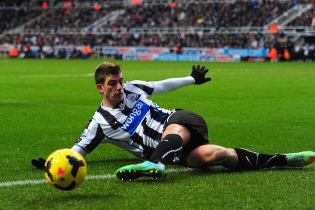 NEWCASTLE UPON TYNE, ENGLAND - JANUARY 12:  Newcastle player Davide Santon  in action during the Barclays Premier League match between Newcastle United and Manchester City at St James' Park on January 12, 2014 in Newcastle upon Tyne, England.  (Photo by Stu Forster/Getty Images)