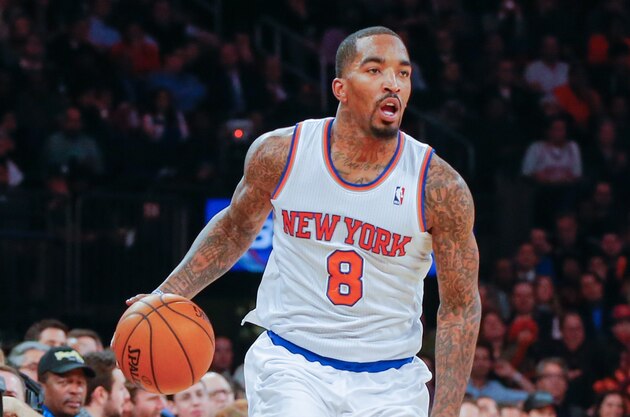 Dec 16, 2013; New York, NY, USA; New York Knicks shooting guard J.R. Smith (8) brings the ball up court during the second half against the Washington Wizards at Madison Square Garden. Washington Wizards defeat the New York Knicks 102-101. Mandatory Credit: Jim O'Connor-USA TODAY Sports Dec 16, 2013; New York, NY, USA; New York Knicks shooting guard J.R. Smith (8) brings the ball up court during the second half against the Washington Wizards at Madison Square Garden. Washington Wizards defeat the New York Knicks 102-101. Mandatory Credit: Jim O'Connor-USA TODAY Sports