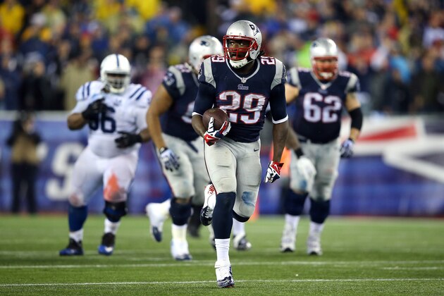 FOXBORO, MA - JANUARY 11:  LeGarrette Blount #29 of the New England Patriots runs a 73 yard touchdown in the fourth quarter against the Indianapolis Colts during the AFC Divisional Playoff game at Gillette Stadium on January 11, 2014 in Foxboro, Massachusetts.  (Photo by Al Bello/Getty Images)