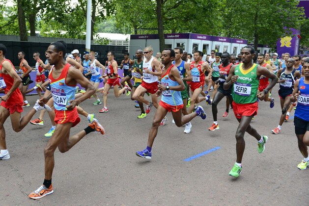 Aug 12, 2012; London, United Kingdom; A general view as runners take off at the start of the men's marathon during the London 2012 Olympic Games at The Mall. Mandatory Credit: Christopher Hanewinckel-USA TODAY Sports