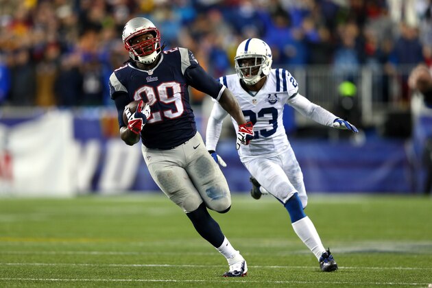 FOXBORO, MA - JANUARY 11:  LeGarrette Blount #29 of the New England Patriots runs the ball against the Indianapolis Colts during the AFC Divisional Playoff game at Gillette Stadium on January 11, 2014 in Foxboro, Massachusetts.  (Photo by Elsa/Getty Images)