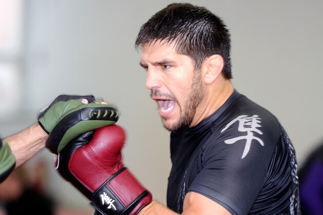MONTREAL, CANADA - JUNE 27:  Patrick Cote trains with a sparring partner during a public training session on June 27, 2012 in Montreal, Quebec, Canada.  (Photo by Richard Wolowicz/Getty Images for Zuffa)