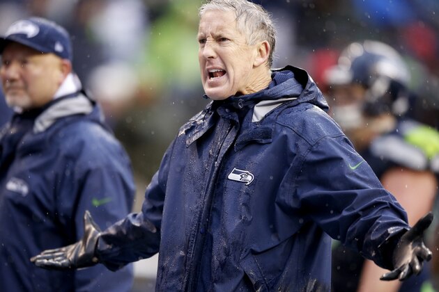 SEATTLE, WA - JANUARY 11:  Head coach Pete Carroll of the Seattle Seahawks reacts in the first half while taking on the New Orleans Saints during the NFC Divisional Playoff Game at CenturyLink Field on January 11, 2014 in Seattle, Washington.  (Photo by Otto Greule Jr/Getty Images)