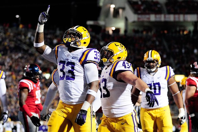 OXFORD, MS - OCTOBER 19:  Jeremy Hill #33 of the LSU Tigers celebrates a touchdown against the Ole Miss Rebels during a game at Vaught-Hemingway Stadium on October 19, 2013 in Oxford, Mississippi.  Ole Miss won the game 27-24.  (Photo by Stacy Revere/Getty Images)