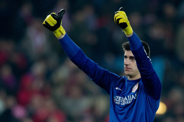 MADRID, SPAIN - JANUARY 11:  Goalkeeper Thibaut Courtois of Atletico de Madrid greets the audience after the La Liga match between Club Atletico de Madrid and FC Barcelona at Vicente Calderon Stadium on January 11, 2014 in Madrid, Spain.  (Photo by Gonzalo Arroyo Moreno/Getty Images)