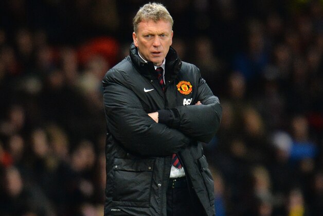 MANCHESTER, ENGLAND - JANUARY 11:  Manchester United Manager David Moyes looks on during the Barclays Premier League match between Manchester United and Swansea City at Old Trafford on January 11, 2014 in Manchester, England.  (Photo by Shaun Botterill/Getty Images)