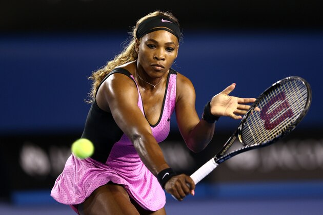 MELBOURNE, AUSTRALIA - JANUARY 13:  Serena Williams of the United States plays a backhand in her first round match against Ashleigh Barty of Australia during day one of the 2014 Australian Open at Melbourne Park on January 13, 2014 in Melbourne, Australia.  (Photo by Cameron Spencer/Getty Images)
