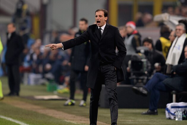 MILAN, ITALY - DECEMBER 16:  Head coach AC Milan Massimiliano Allegri reacts during the Serie A match between AC Milan and AS Roma at San Siro Stadium on December 16, 2013 in Milan, Italy.  (Photo by Claudio Villa/Getty Images)