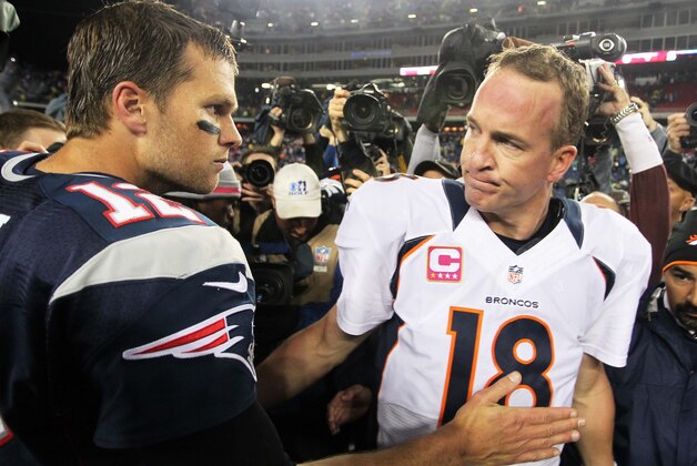 Oct 7, 2012; Foxborough, MA, USA; New England Patriots quarterback Tom Brady (12) shakes hands with Denver Broncos quarterback Peyton Manning (18) following the game at Gillette Stadium. The Patriots defeated the Broncos 31-21. Mandatory Credit: Stew Milne-USA TODAY Sports