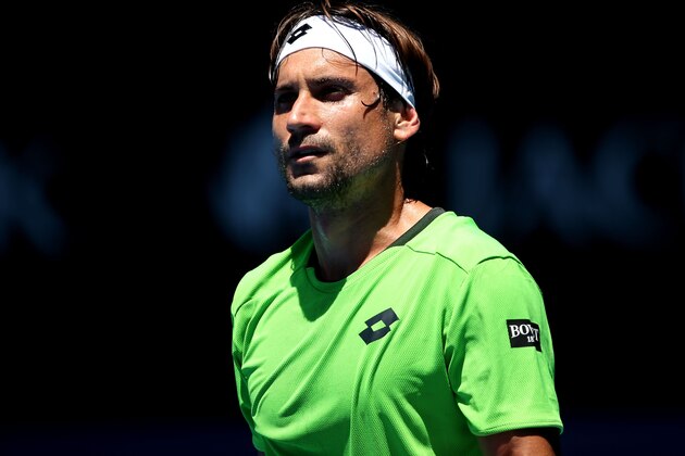 MELBOURNE, AUSTRALIA - JANUARY 13:  David Ferrer of Spain looks on in his first round match against Alejandro Gonzalez of Colombia during day one of the 2014 Australian Open at Melbourne Park on January 13, 2014 in Melbourne, Australia.  (Photo by Clive Brunskill/Getty Images)