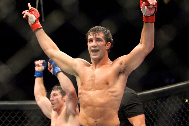 July 14, 2012; Portland, OR, USA; Luke Rockhold celebrates his win over Tim Kennedy in the middleweight championship fight at MMA Strikeforce at the Rose Garden Arena. Mandatory Credit: Scott Olmos-USA TODAY Sports July 14, 2012; Portland, OR, USA; Luke Rockhold celebrates his win over Tim Kennedy in the middleweight championship fight at MMA Strikeforce at the Rose Garden Arena. Mandatory Credit: Scott Olmos-USA TODAY Sports